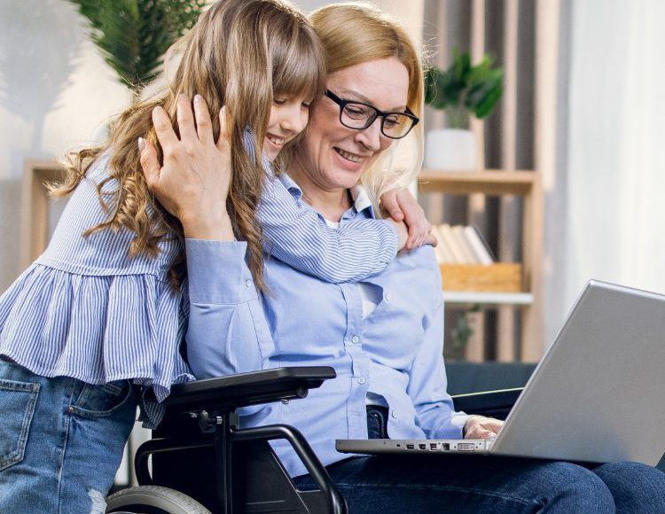 Mother in wheelchair with her child